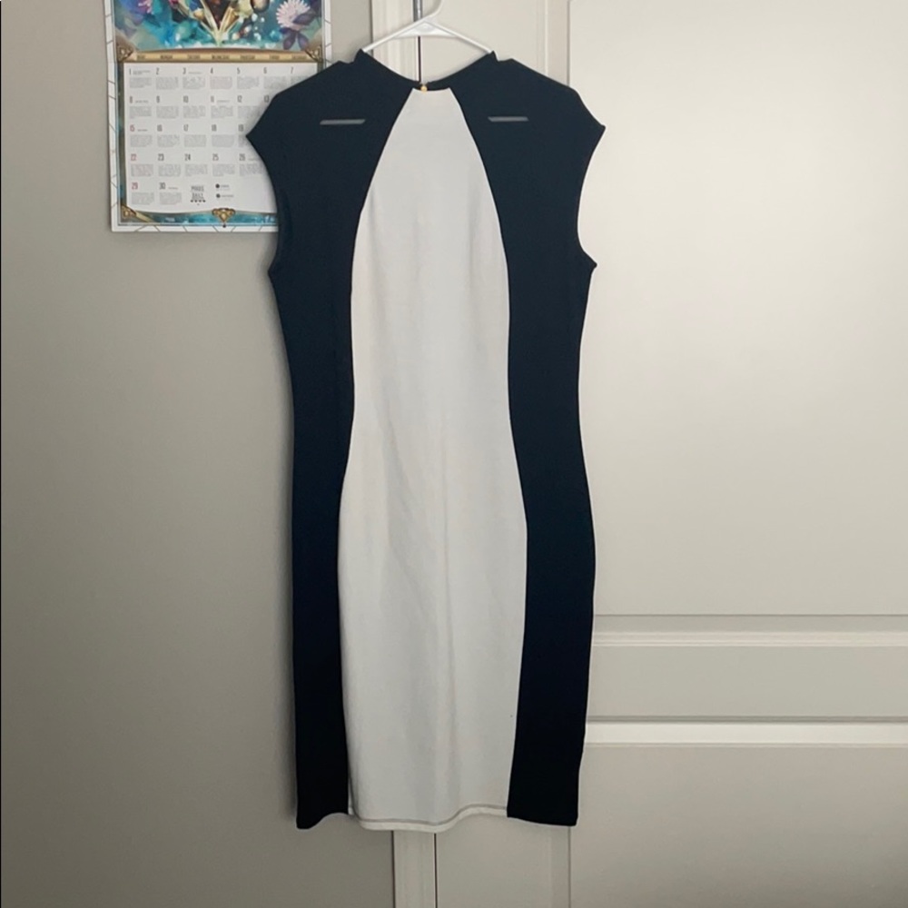 Cocktail length black and white dress